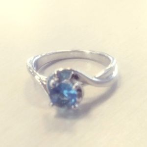 Silver-plated aqua colored CZ ring size 5